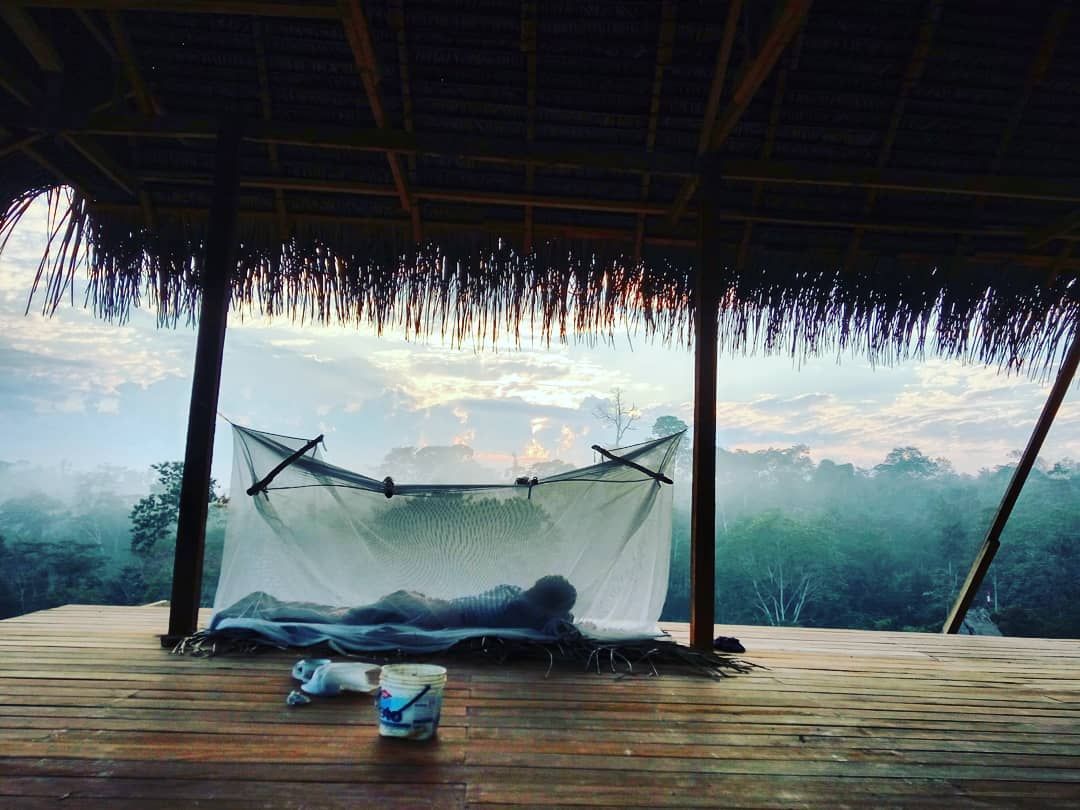 Hammock under thatch roof, at Ampiri.