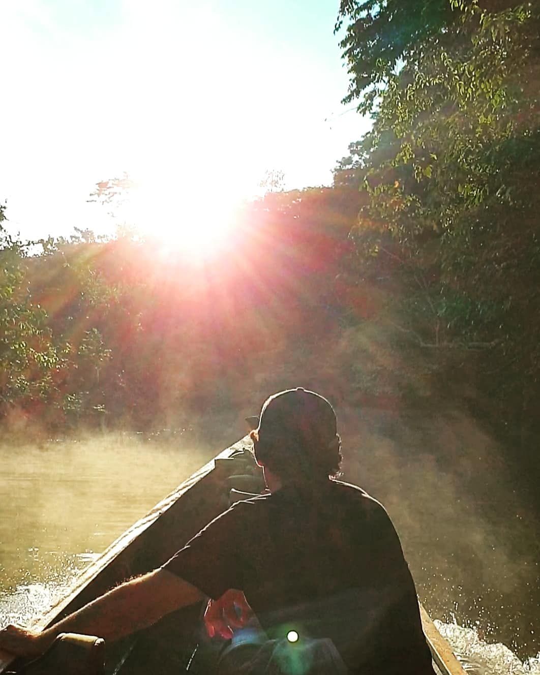 Silhouette at sunrise, back to camera, at Ampiri.