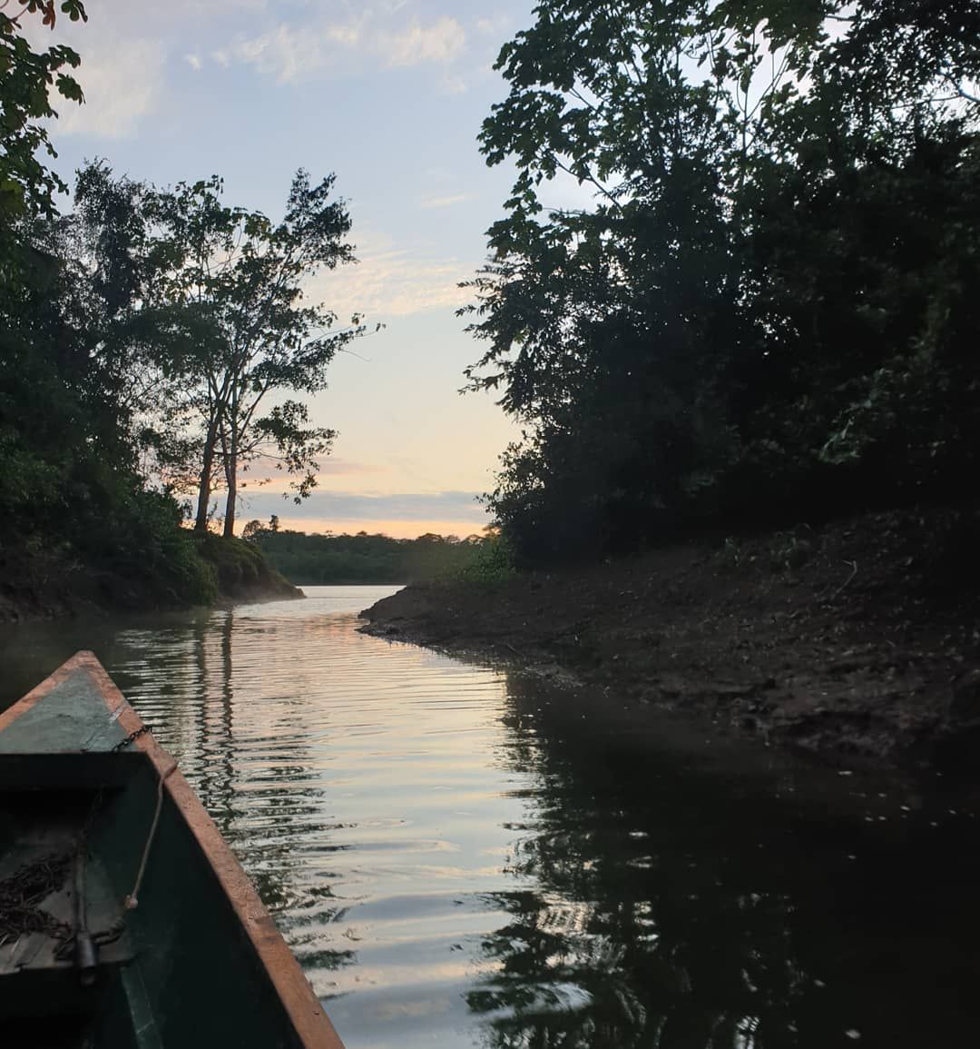 River with boat in forest, at Ampiri.