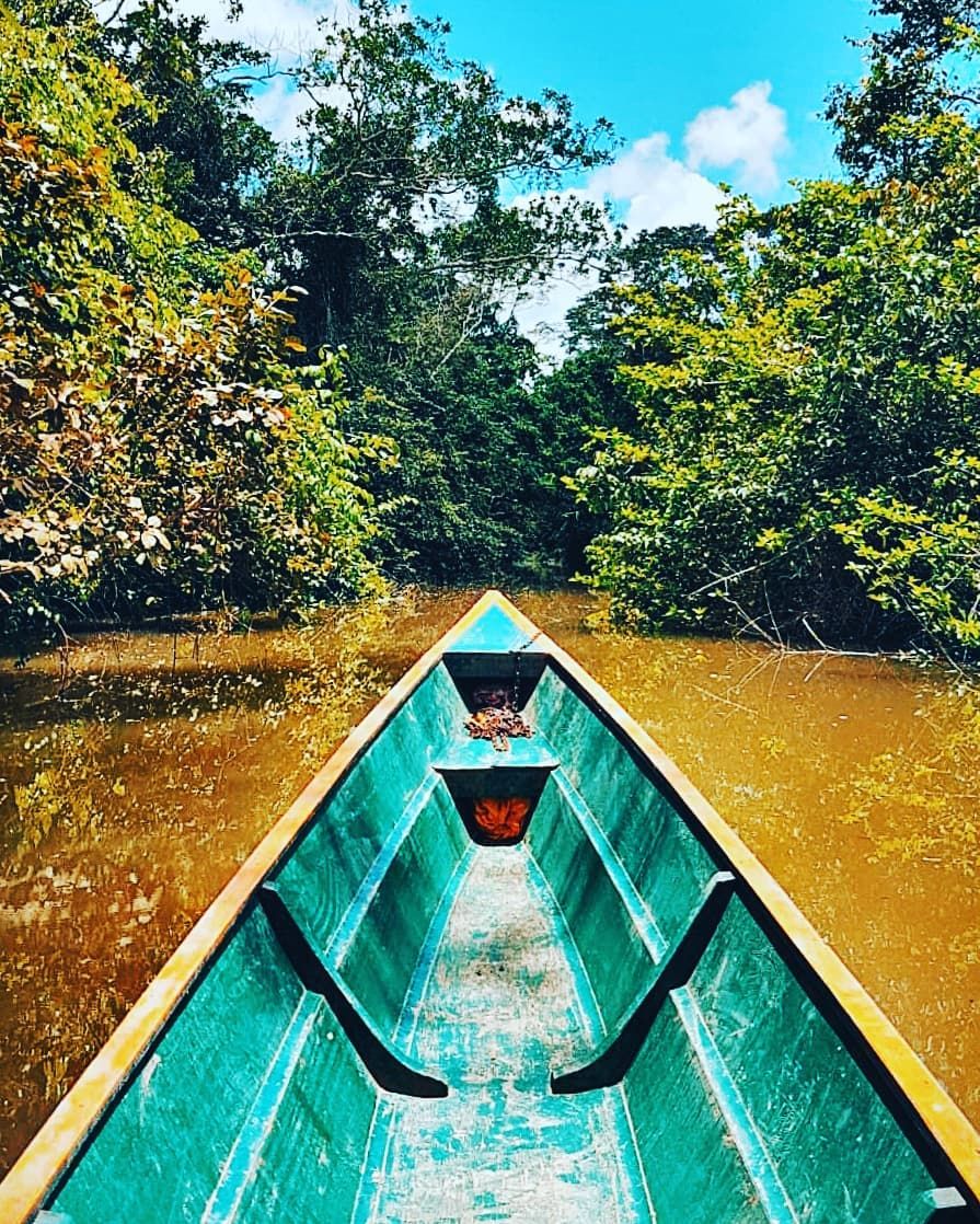 Turquoise canoe from above, at Ampiri.
