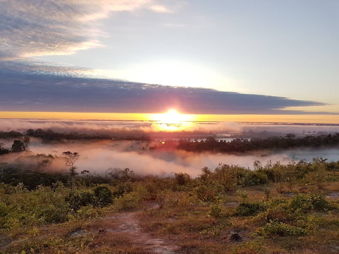 Sunset over mist field, at Ampiri.