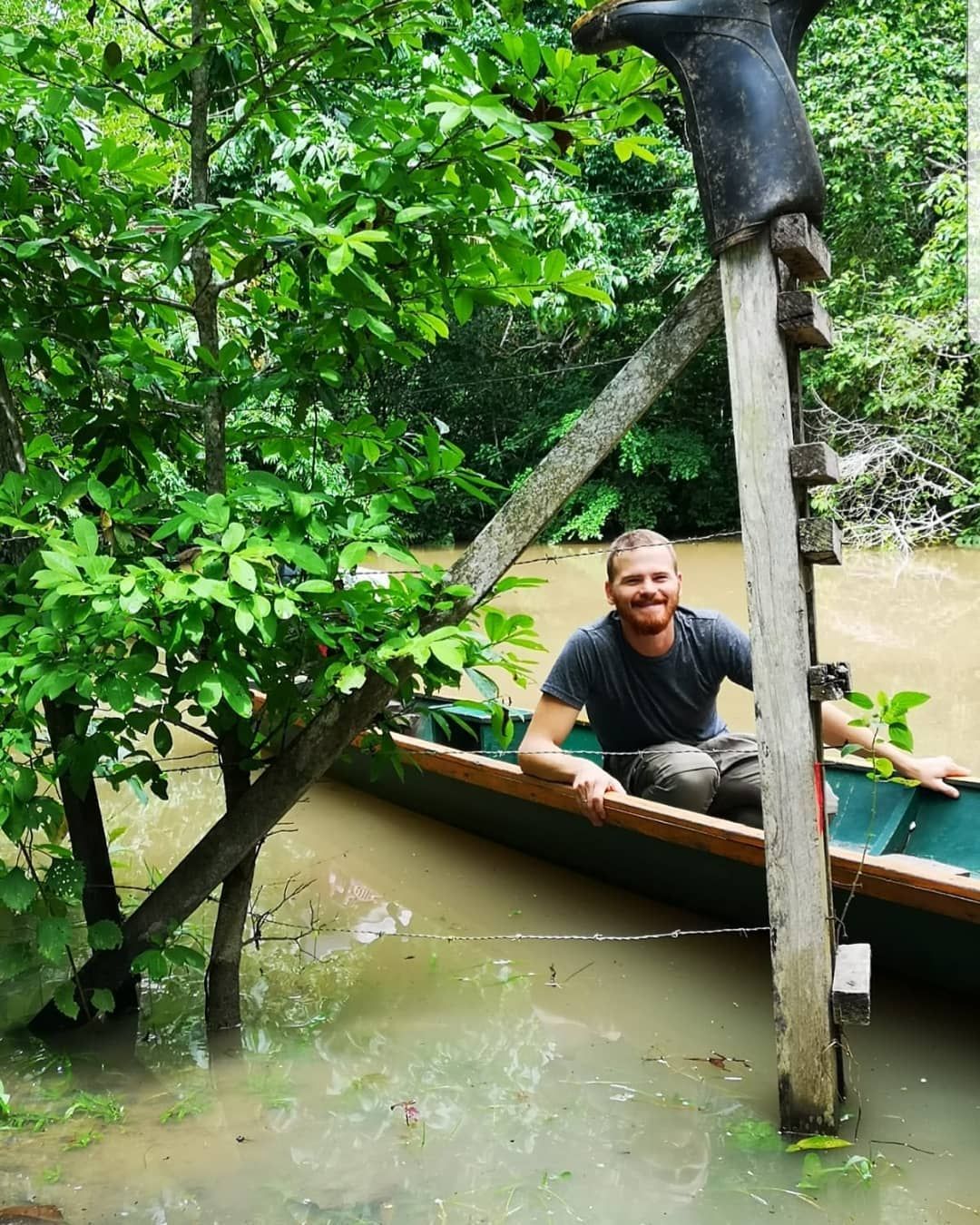 Man in canoe from above, small, at Ampiri.