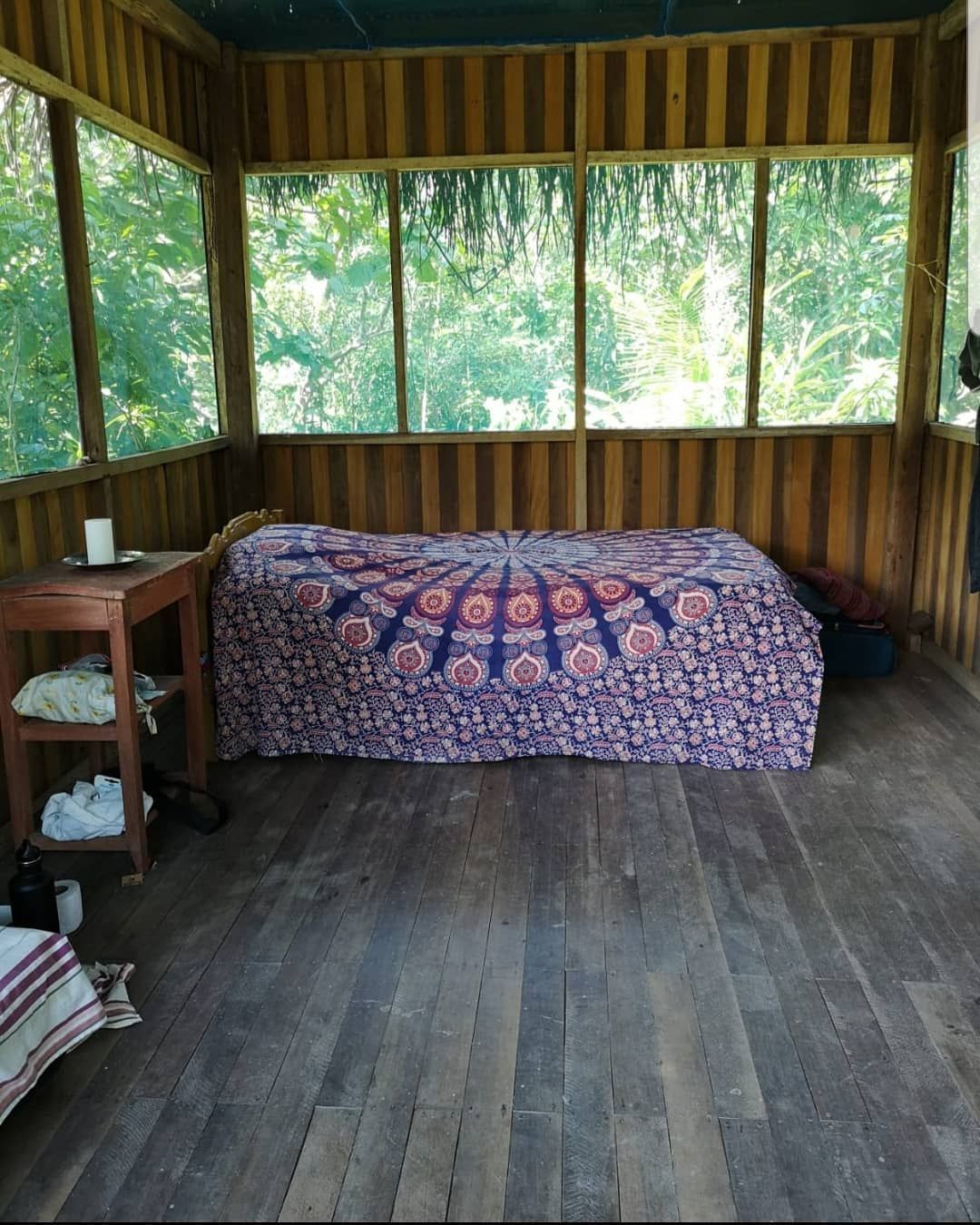 Room interior with bed, at Ampiri.