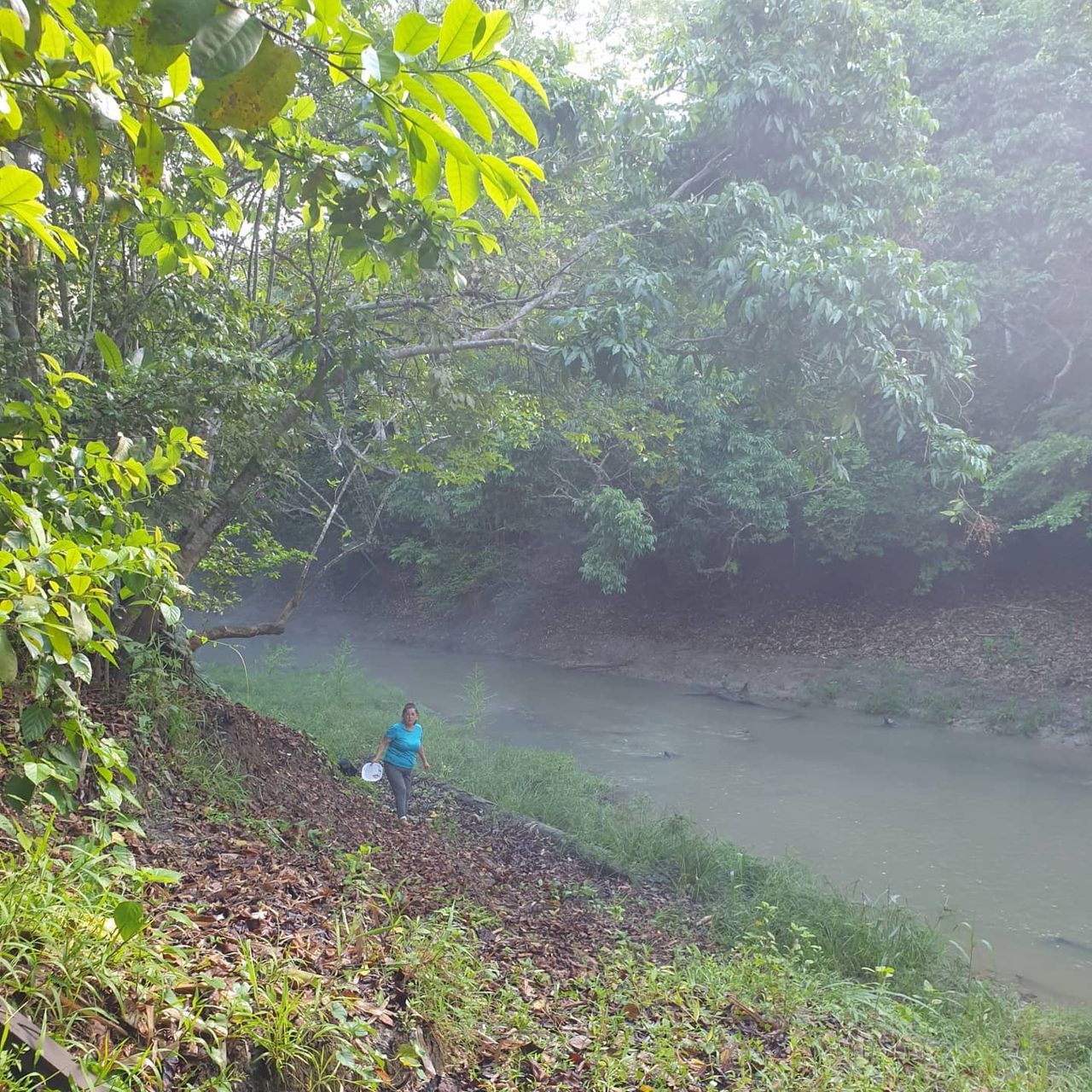 River with tiny figure, at Ampiri.