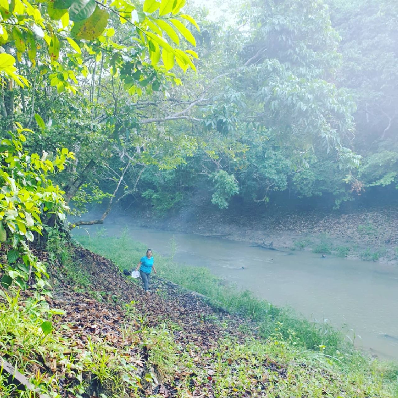 River with tiny figure, at Ampiri.