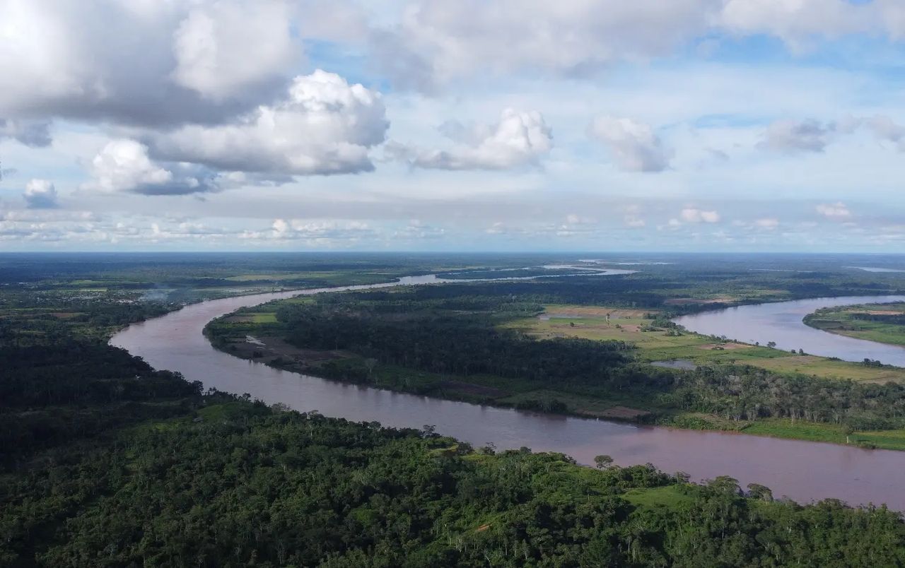 Aerial river through forest, at Ampiri.