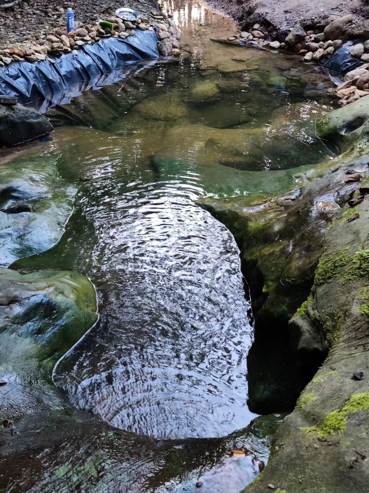 Stone in stream, at Ampiri.