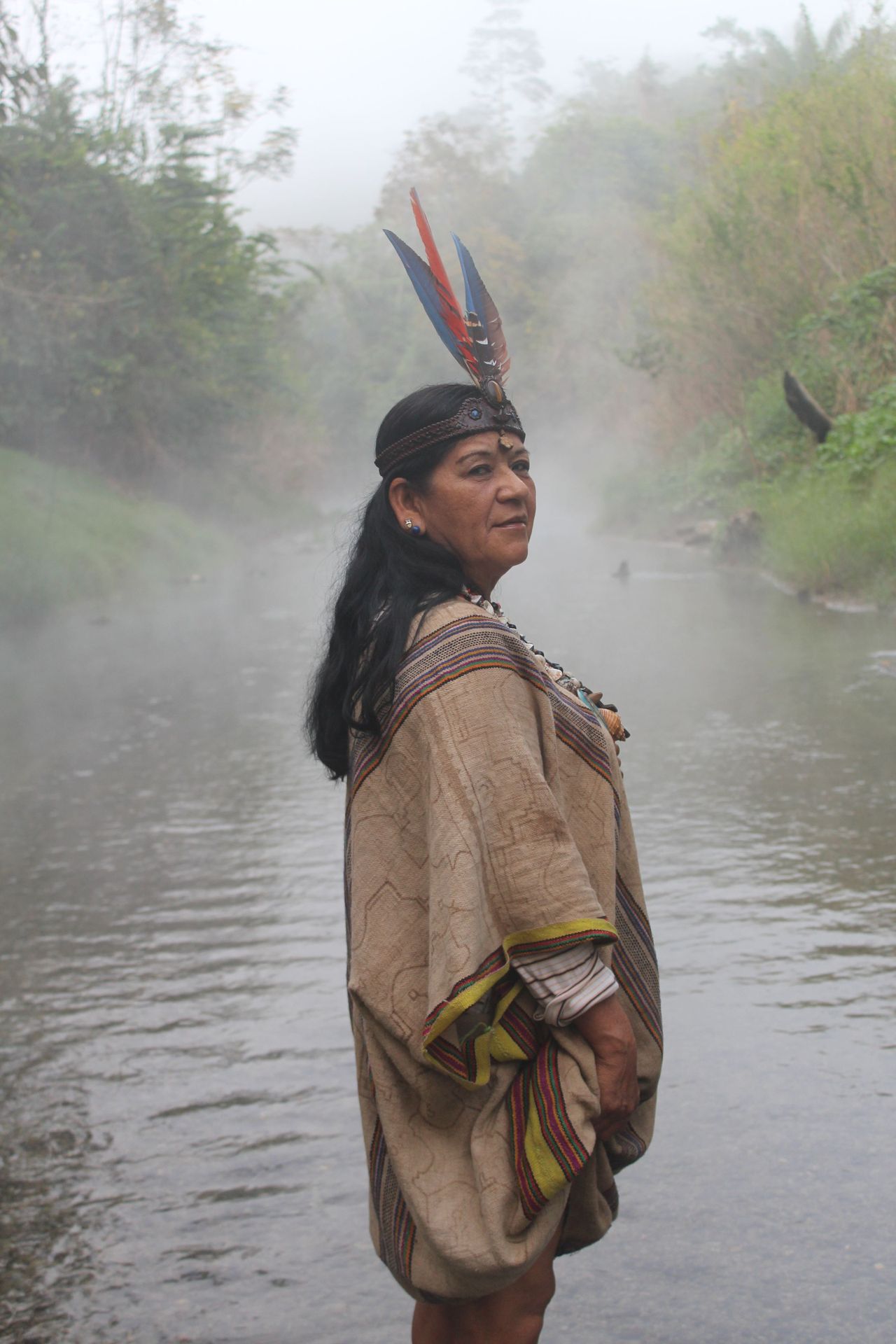 Reyna Luz Edery in the steaming river.